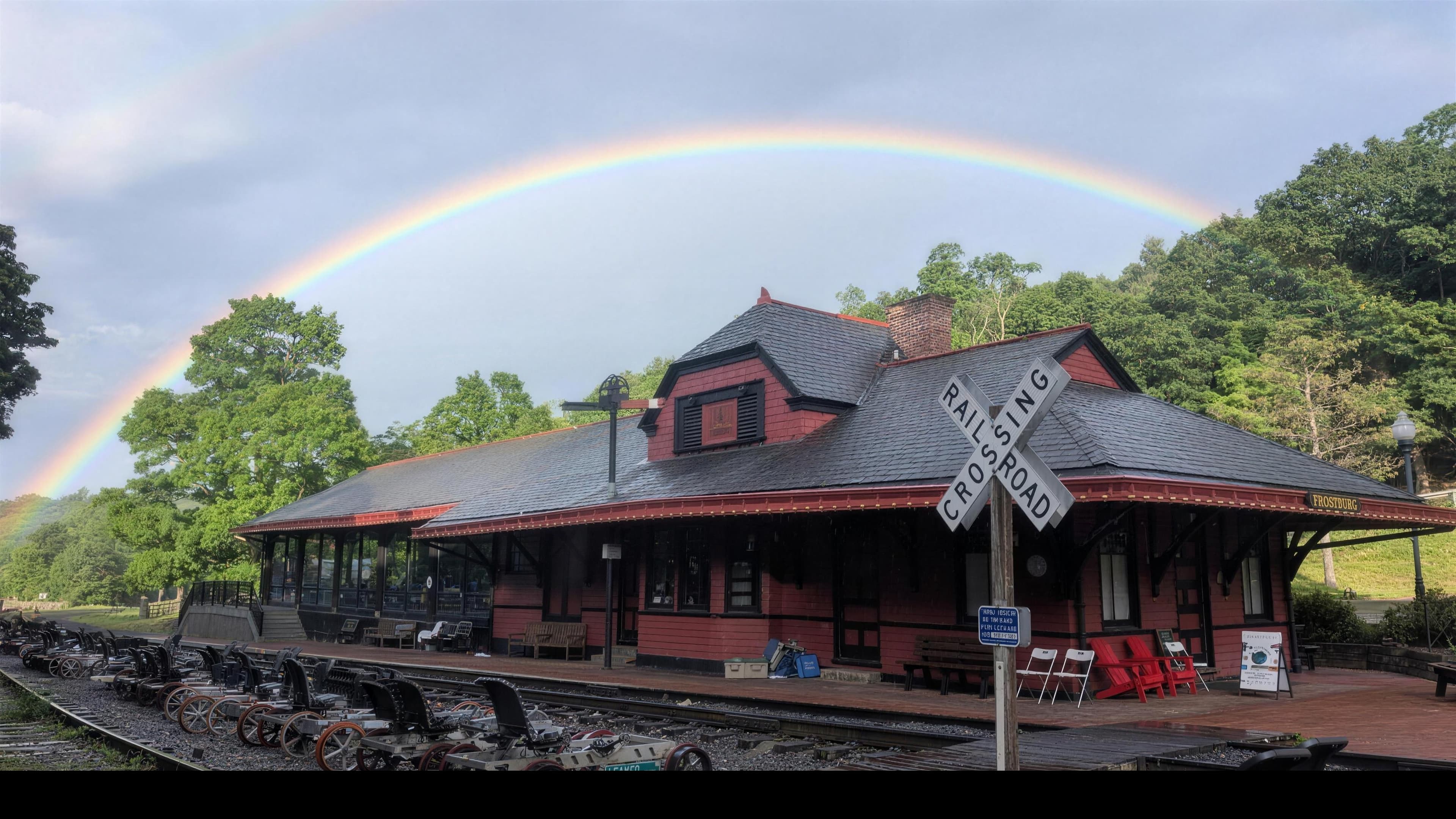 A rainbow over the historic Frostburg depot, seen from the hotel porch
