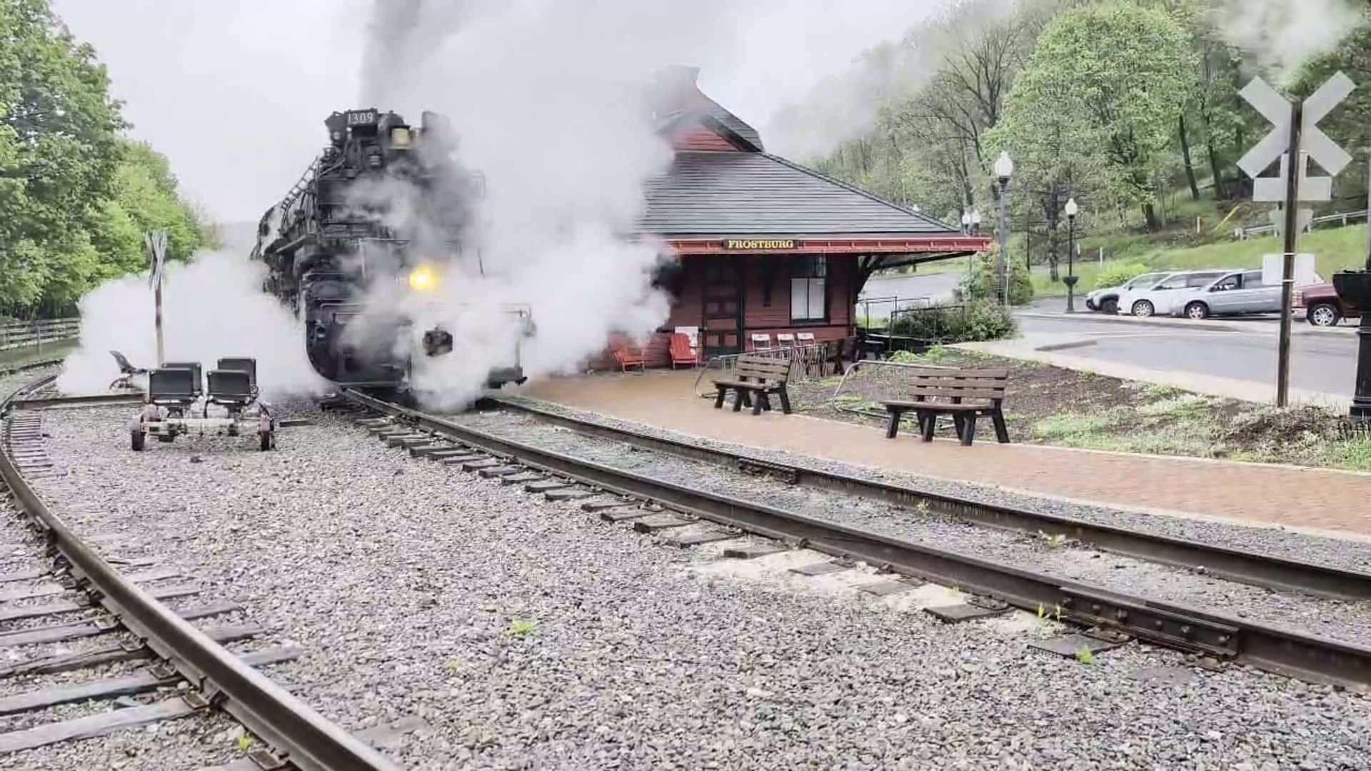 Steam locomotive working the Western Maryland Scenic Railroad grade near Frostburg, Maryland above the Great Allegheny Passage
